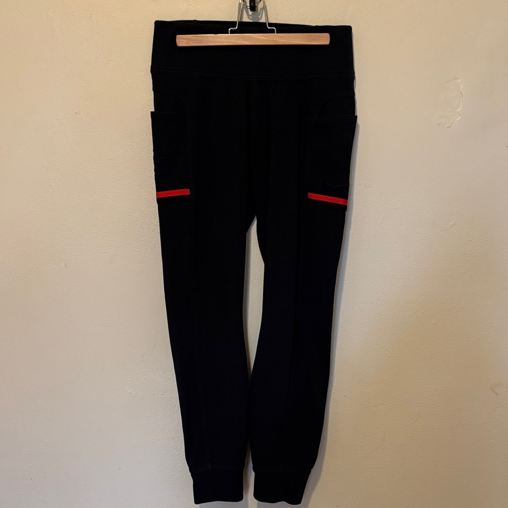 Nike Black Leggings with Bold Red Accents